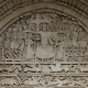 Romanesque stone tympanum of the Abbey Church of Saint-Pierre in Beaulieu-sur-Dordogne, France.