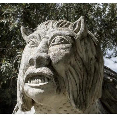 Stone sculpture of the legendary Tarasque creature in Tarascon, France.